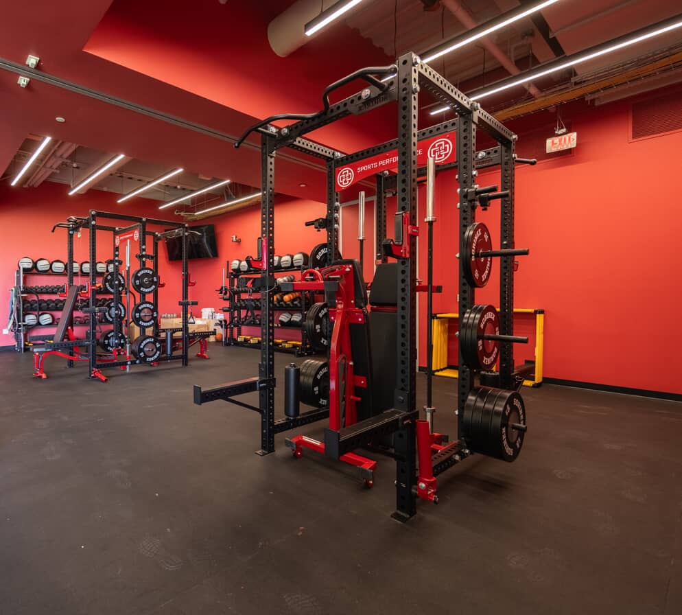 image of a gym with a squat rack